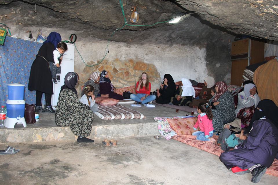  A meeting with small women group at one of Junba’s woman House in a cave; in which this meeting aimed to recognize women’s conditions and their sufferings from water and sewage problems.