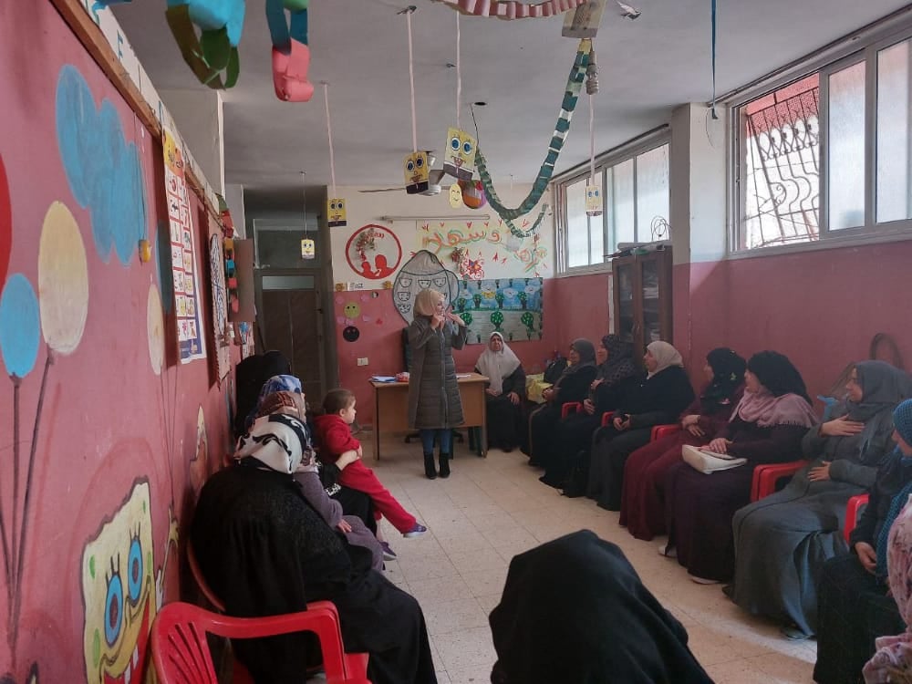  Psychological and social support meeting for women in Al Sha`af in the Gaza Strip
